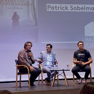 Le présentateur au centre, Patrick Sobelman, (à gauche) et Michel Hazanavicius ballad et vous